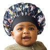 Red by Kiss Baby Satin Bonnet Sleep Cap for Infants, Soft, Stretchy, and Safe, Protects Baby Hair from Frizz & Breakage, Friction Bald Spots (Unicorn/Cupcake, 6-18M)(Black Unicorn)